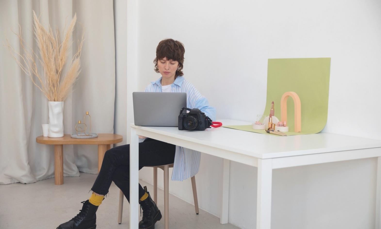 Professional using advanced financial analysis software with multiple data visualizations